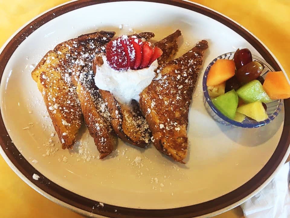french toast with fruits at the side